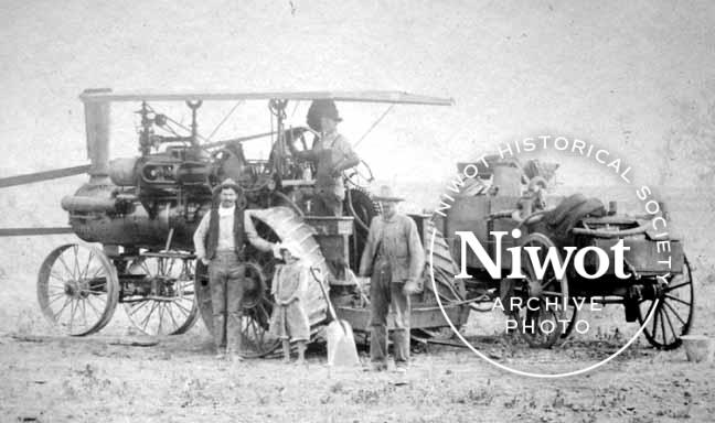 Otis Clyde Bolton with Steam Tractor