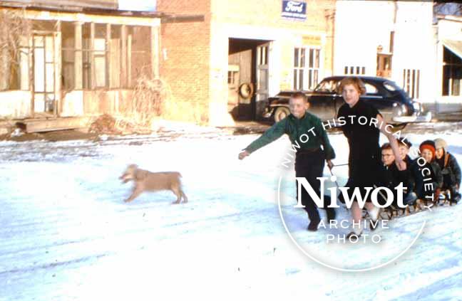 Sledding on Main Street